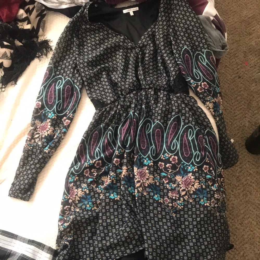 a long sleeve dress with some cute designs